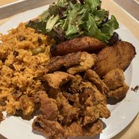 Sampler platter with chicken  at Casa Borinqueña in San Francisco