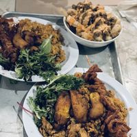 Two sampler plates and bori fries  at Casa Borinqueña in San Francisco