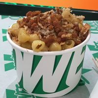 Vegan mac n’ cheese with vegan ‘bacon’ and onion.  at Oowee Vegan in Brighton