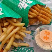 Fries and waffle fries at Oowee Vegan in Brighton