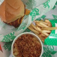 Double bacon cheeseburger, regular fries and mini mac and cheese! at Oowee Vegan in Brighton