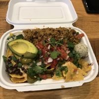 Vegan nachos (I added vegan taco meat & avocado )  at Native Foods in Boulder