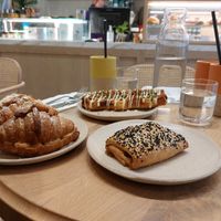 Puffdog, sesame mushroom bun and 2 almond croissants at Holy Llama - Sintagma in Athens