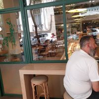 Lots of seating options, air conditioning inside at Holy Llama - Sintagma in Athens