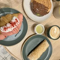 Pastry, ginger shot and lovely cappuccino  at Holy Llama - Sintagma in Athens