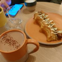 Puffy Dog + oat chocolate + cappuccino (single) at Holy Llama - Sintagma in Athens