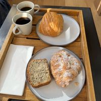 Takeaway of a pain au chocolat, almond croissant and lemon and Chia cake  at Holy Llama - Sintagma in Athens