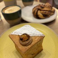 Praline duffin (doughnut-muffin combo filled with hazelnut cream) and a chocolate babka (braided bread)  at Holy Llama - Sintagma in Athens