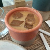Sweet mug with iced latte (Single) at Holy Llama - Sintagma in Athens