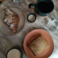 Almond croissant & mushroom pastry. at Holy Llama - Sintagma in Athens