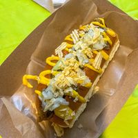 Classic dog! Seitan dog with sweet relish, mustard, onion & green onion, crushed potato chips! This was huge. Super messy, but good! at Basil & Bunny in Bristol