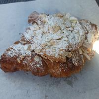 Almond croissant at Slow Sourdough & Co in Almada