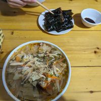 Noodle soup and deep fried mushroom rolls wrapped in nori at Hoa Tâm in Sapa