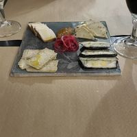 Vegan cheese tapa with home made marmalade and pickled onion  at La Perra Verde in Barcelona