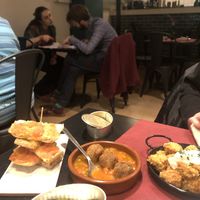 Pan con tomate, palomitas   at La Perra Verde in Barcelona