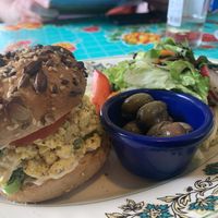 Tofu scramble and bagel (tastes like the BEST vegan “egg” salad)   at PENTAGON in Lisbon