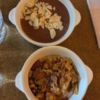 Chocolate mousse (top) and banana cream dessert (bottom) at Bloom Sushi in Paris