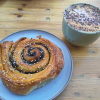 Black tahini and miso caramel swirl, and cappuccino at Forest Bakery in Bristol