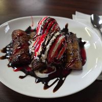 Fried plantains with vanilla soy ice cream with chocalate and strawberry sauce at El Cantaro Vegan Taqueria in Sacramento