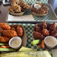 Assortment of wings, BBQ, Buffalo and teriyaki along with some fried oyster mushrooms  at Happy Vegan in Fountain Valley