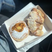 Passion fruit custard filled donut and almond croissant 🥐.   at Miss Sina in Marrickville