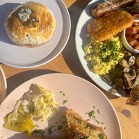 Toastie (bottom) big breaky (top) and passion fruit creme brûlée doughnut   at Miss Sina in Marrickville
