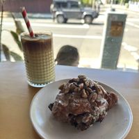 Pistachio oat latte, banana and pecan fritter   at Miss Sina in Sydney