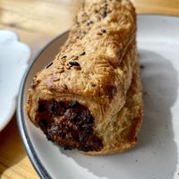 Vegan kimchi sausage rolll with a  at Miss Sina in Marrickville