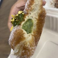 Pistachio cream doughnut interior 🤤  at Miss Sina in Marrickville