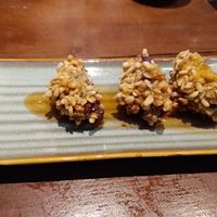 Deep Fried Local Potato With Hanoi's Young Rice, Passion Fruit Sauce. at Cai Mam Bistro - Signature Vegan in Hanoi