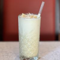 Rum and fresh pineapple juice, and they finalised it with fresh coconut   at PiranArt Boutique hotel in Piran