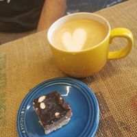 Cappuccino oats and home made vegan cookie at C&P Craft Coffee Roasters in Mossel Bay
