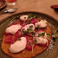 Carrot pizza with cashew cream at Soul Kitchen in Ghent