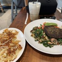 The vegan hash with hashbrowns and a pistachio latte on oat milk  at Wildberry - Water Tower Place in Chicago