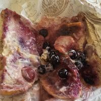 Bagel with vegan spread and fruit absolutely melted everywhere at Brooklyn Bagel Factory in Cambridge