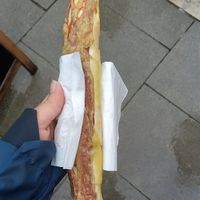 "bacon stangerl" or something like this - doesn't look great but id a 5/5 at Billa Pflanzilla in Vienna