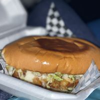 Loaded chorizo con papas torta comes with vegan cheese, crema, avocado, and lettuce   at El Mictlan in Spring