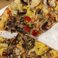 Cheesy pizza with veggies (artichoke, mushrooms, pepper, tomatoes, tofu) at Pizzano in Alba Iulia