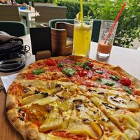 Half potato & truffle, half pestolini pizza at Pizzano in Alba Iulia