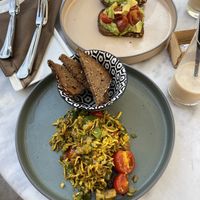 Tofu scramble, avocado toast with roasted tomatoes and almond milk iced coffee  at Café Strauss in Opatija