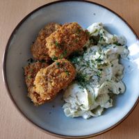Fried tofu with zucchini slices and vegan yogurt at Seed Cuisine in Bucharest