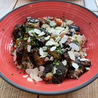 Roasted aubergine, tomato and courgette with bulgur wheat   at The Bench Café in Paris