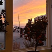 One table for two people is right next to the window, so you can enjoy a beautiful sunset while waiting at PiranArt Restaurant & Gelateria & Caffeteria in Piran