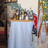 The condiment tray, filled to the brim with tasty oils, dressings and hot sauces! at PiranArt Restaurant & Gelateria & Caffeteria in Piran