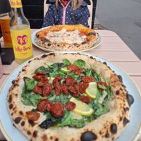 Pizza "Spinach and lemon" and an individual Marinara with Cashew Mozzarella and Parmesan at RAZZO Vegan Pizza Bar in Cologne