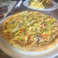 Vegan vegetable Pizza   at Vibes - Restaurant & Cafe in Hurghada