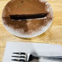 Chocolate cake good. More like fudge   at Zirael Vegan Restaurant in Kyoto