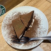 Chocolate cake! Really good, rich and dense. Don’t inhale and choke on the chocolate powder like I did.  at Zirael Vegan Restaurant in Kyoto