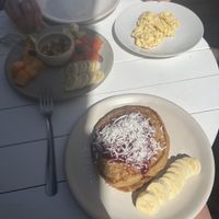 Fruit plate and GF vegan pancakes. (My friend got some eggs)    at Miscelanea Sayulita in Sayulita