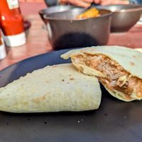 Plant Sausage, Beans and Cheese brioche wrap at Hooper's in Swansea